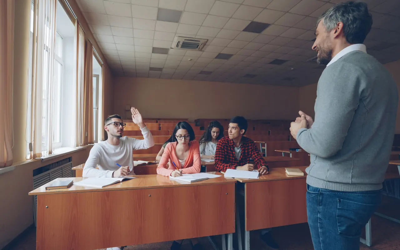 Teacher engaging with learners in a classroom
